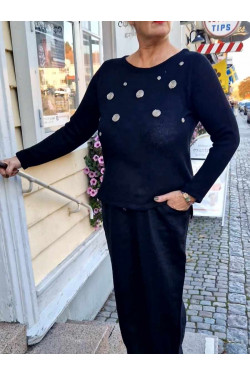 Svart/naturprickig